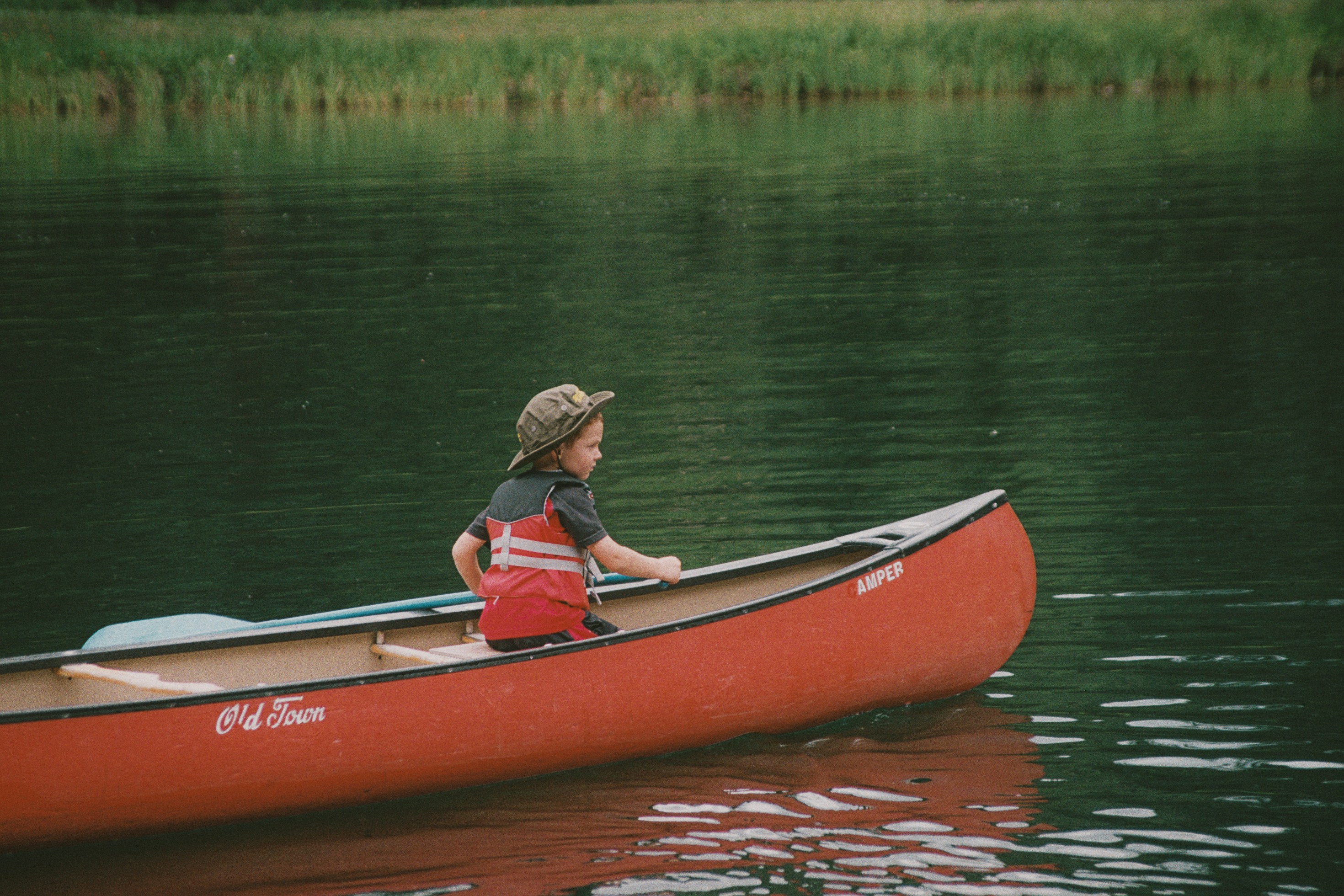 Little boy on canoe