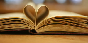 Book pages folded to form a heart